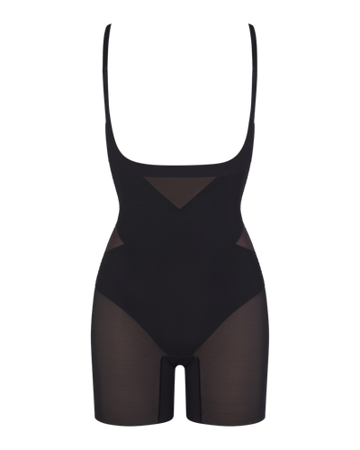 Open-Bust Mid-Thigh Bodysuit shown in Runway